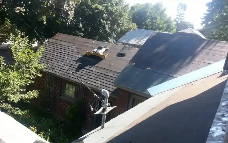 Re-roof under way on a brick Missoula home