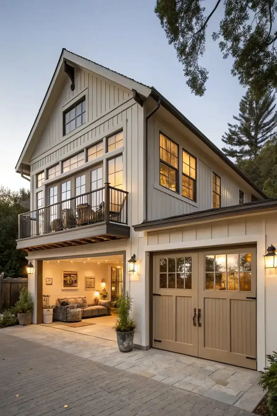 Detached garage apartment with a balcony and carriage doors