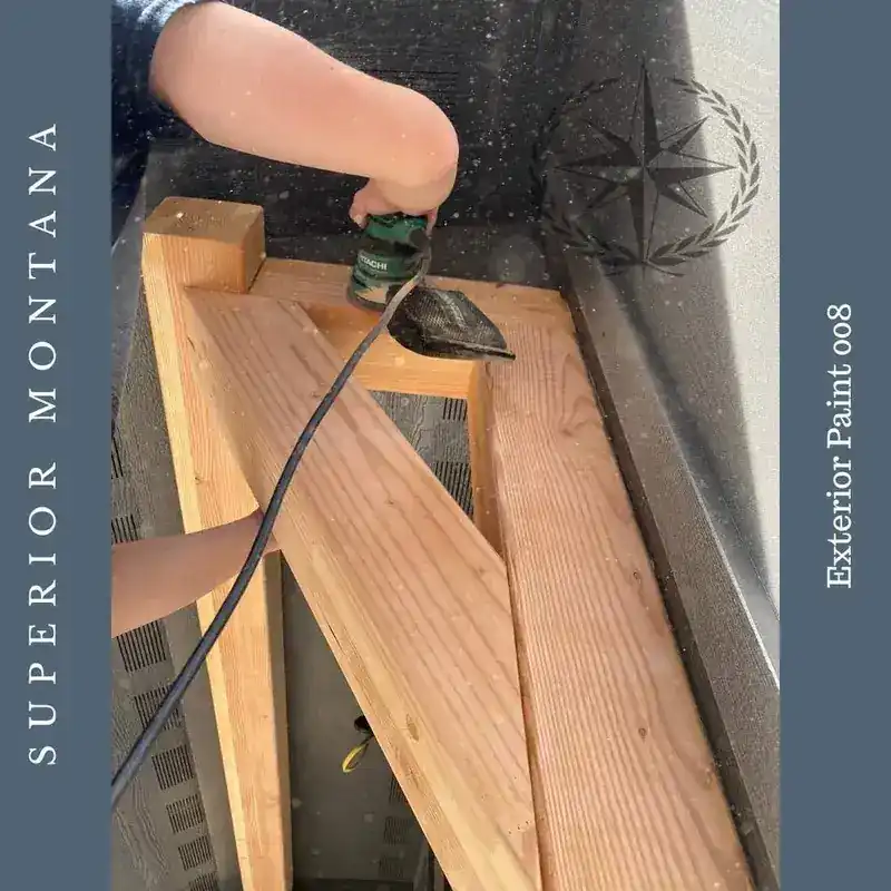 Sanding the timber beams back before finishing