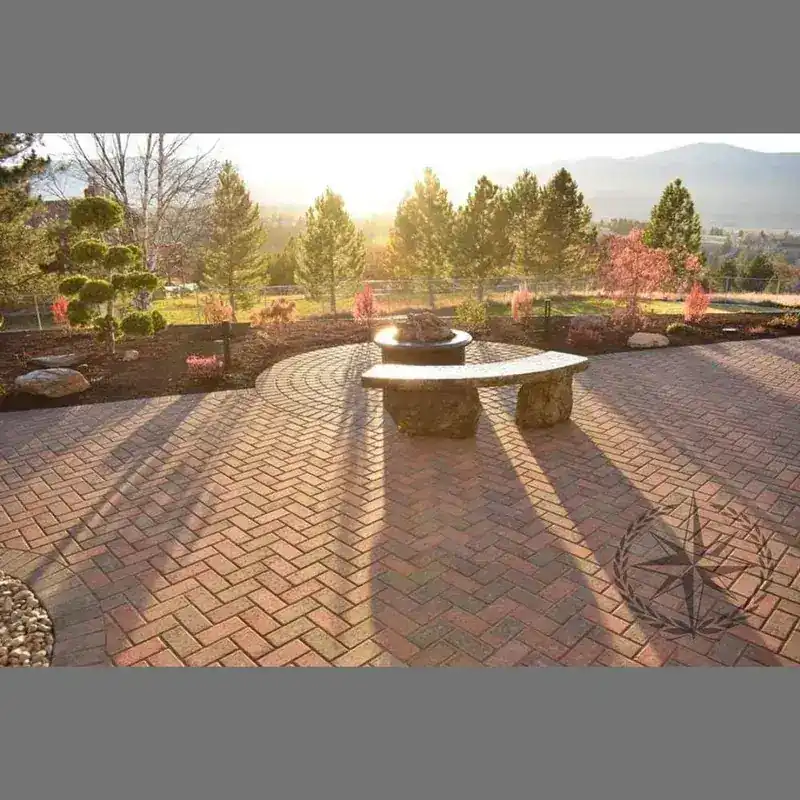 The finished patio and fire pit looking out to the mountains