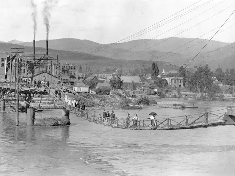 Historic photograph of early Missoula along the river